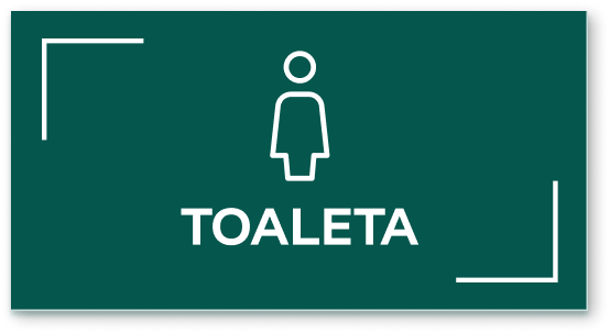 Zielona tabliczka na drzwi toalety z piktogramem