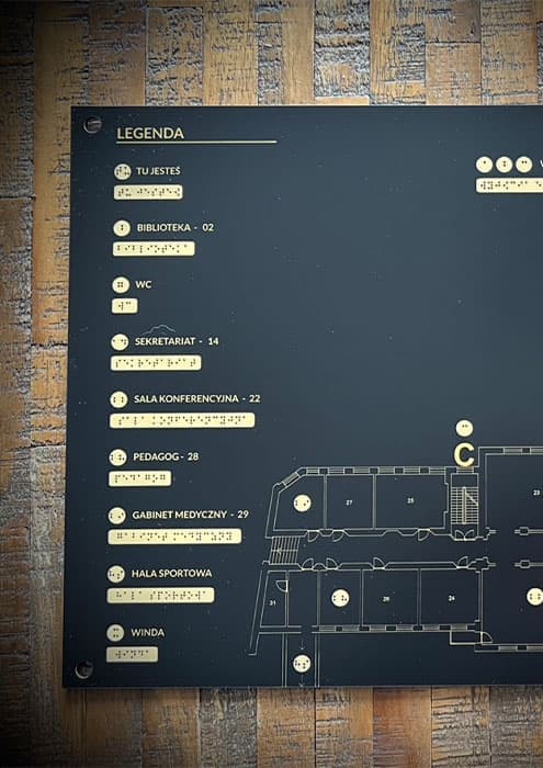 Tabliczka z Braillem wykonana z laminatu, wygrawerowana laserowo na kolor złoty